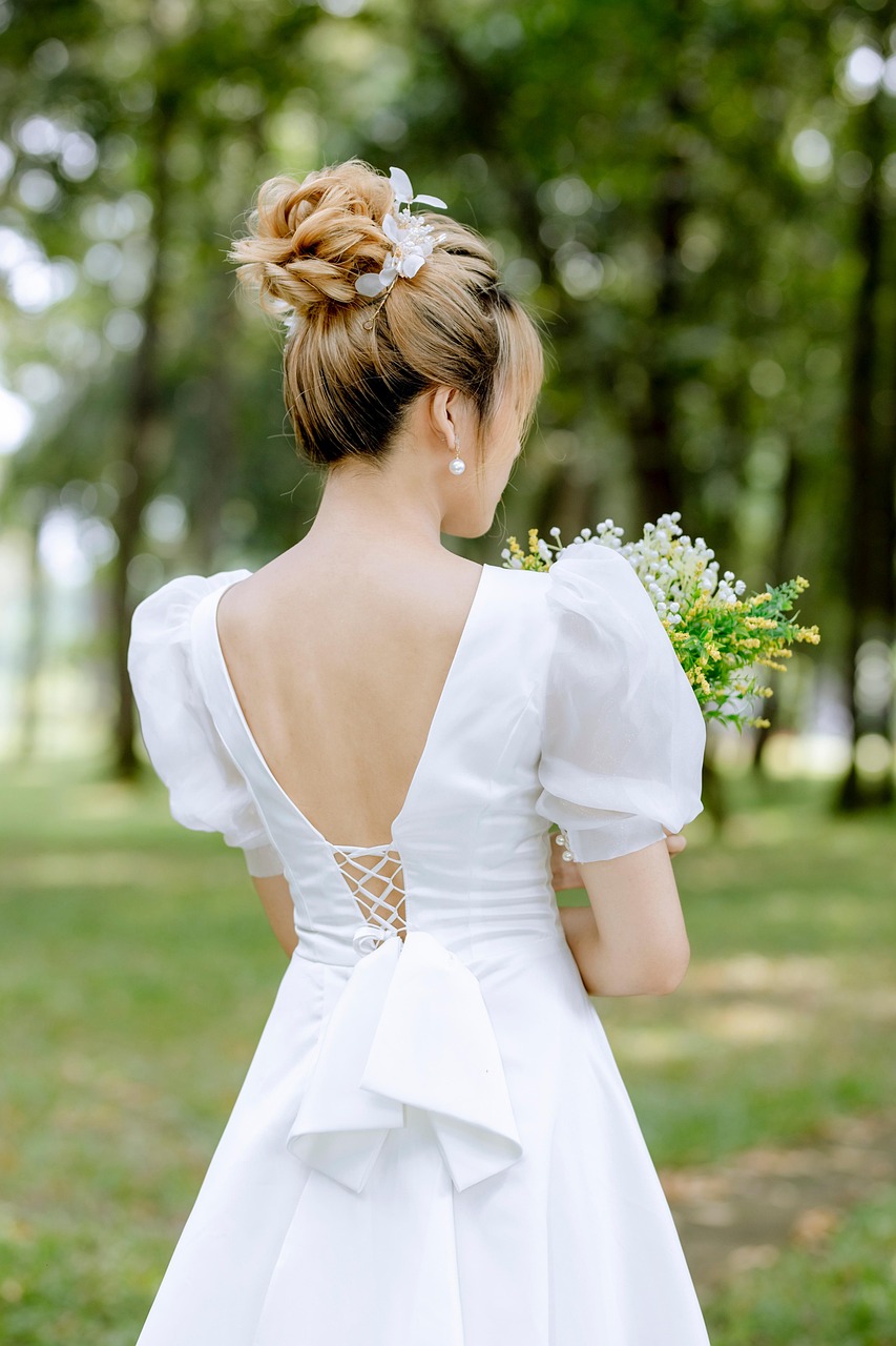 Elegant Wichita bridal updo with floral hair accessories