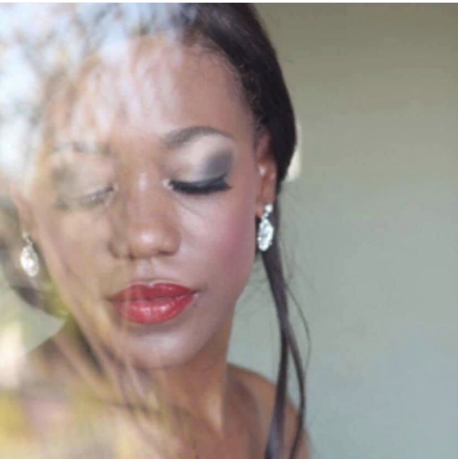 Standing bridal makeup look for Central Park wedding morning